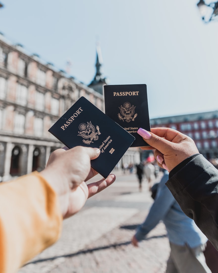 Applicant holding passports for a residency application