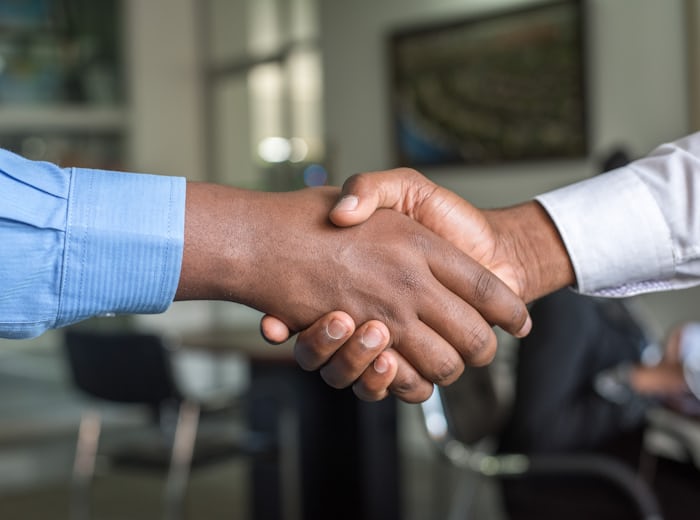 Business handshake sealing an agreement