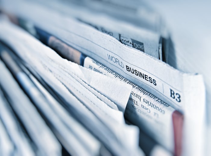 Stack of printed magazines on display