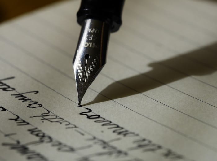 Screenplay and script pages on a writer desk during adaptation
