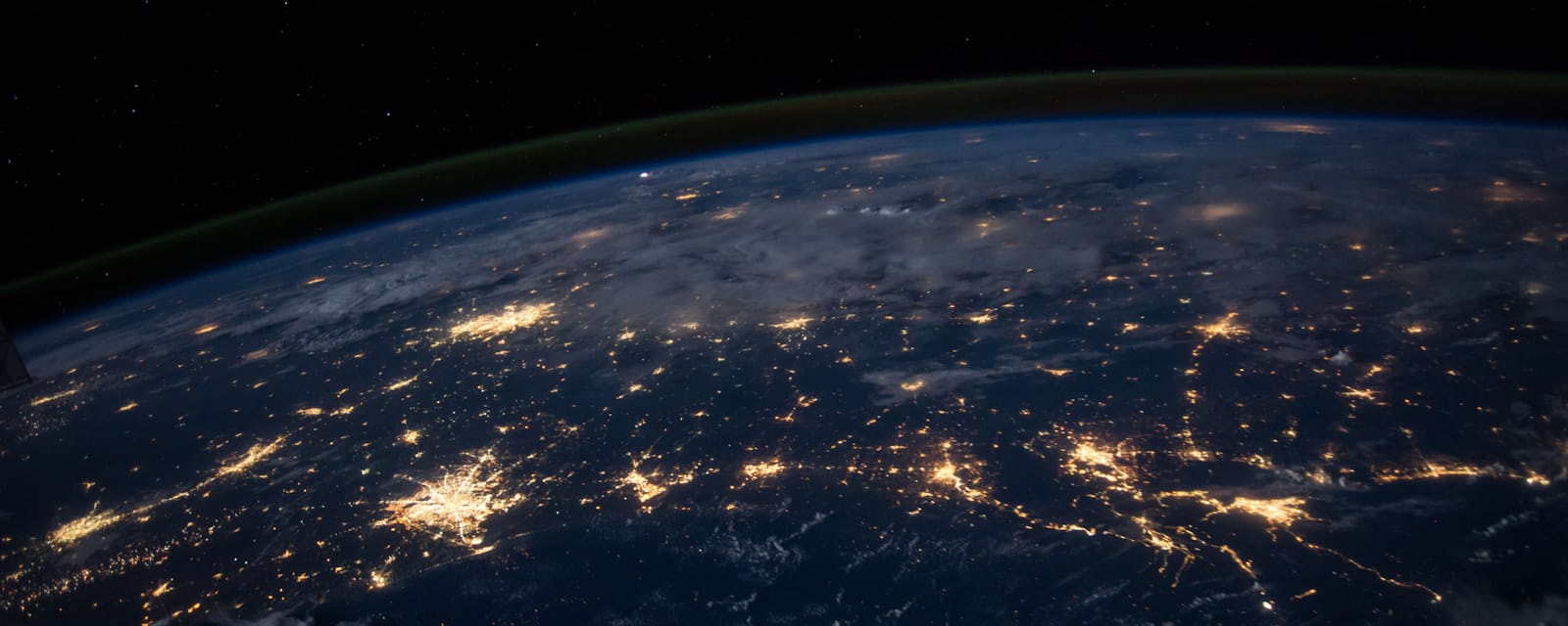 Global network of city lights representing website localization for new markets